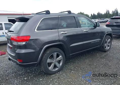 2014 Jeep Grand Cherokee Overland z USA, uszkodzony, nr VIN 1C4RJFCMXEC417525